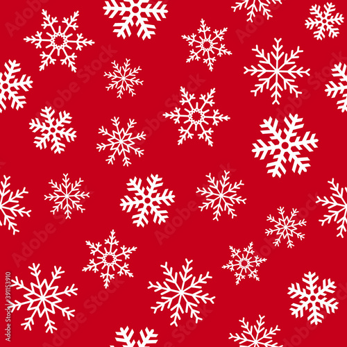 Vector seamless pattern. White snowflakes on a red background. For fabric, textile, wrapping paper, card, invitation, wallpaper, web design
