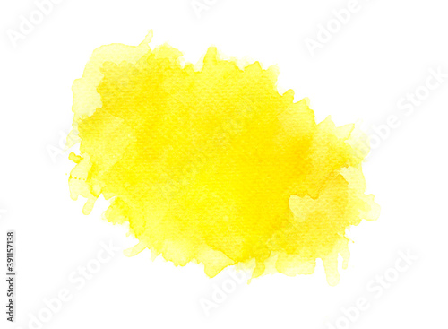 yellow watercolor paint of brush on white.