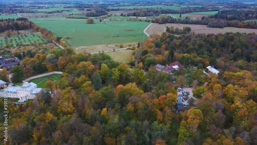 Aerial View of the Krimulda Palace in Gauja National Park Near Sigulda and Turaida, Latvia. Old Manor Garden in Autumn Colorfull Forest Old Valley of the Gauja River, Krimulda City Turaida Castle Aerial View of the Krimulda Palace in Gauja National Park Near Sigulda and Turaida, Latvia. Old Manor Garden in Autumn Colorfull Forest Old Valley of the Gauja River, Krimulda City Turaida Castle