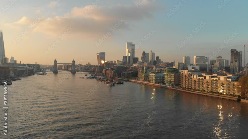 stable drone shot over London Thames river towards city centre sunset stable drone shot over London Thames river towards city centre sunset