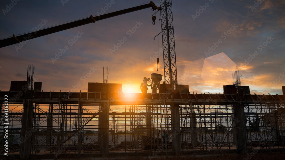 Silhouette Engineer and construction team working at site over blurred  industry background with Light fair Film Grain effect.Create from multiple reference images together