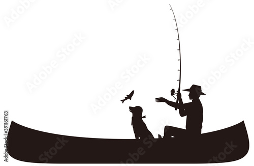 カヌーで釣りをする男性と犬