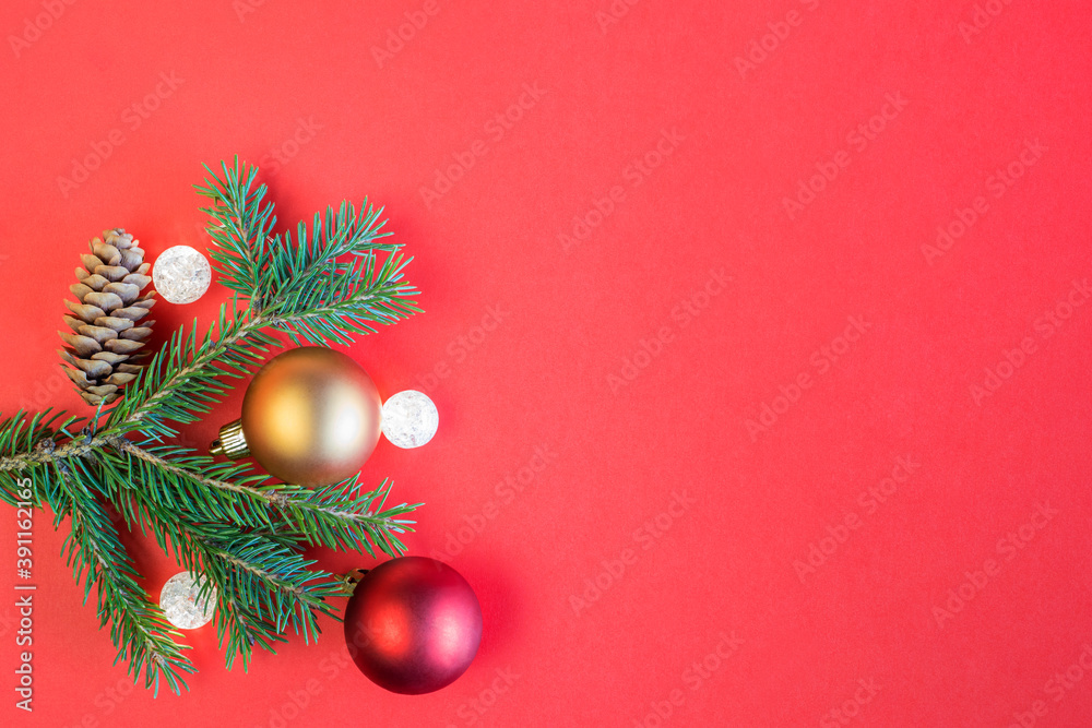Christmas decoration on red background with copy space