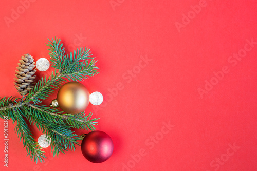Christmas decoration on red background with copy space
