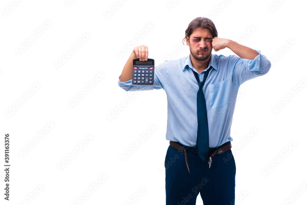 Young male bookkeeper with calculator isolated on white