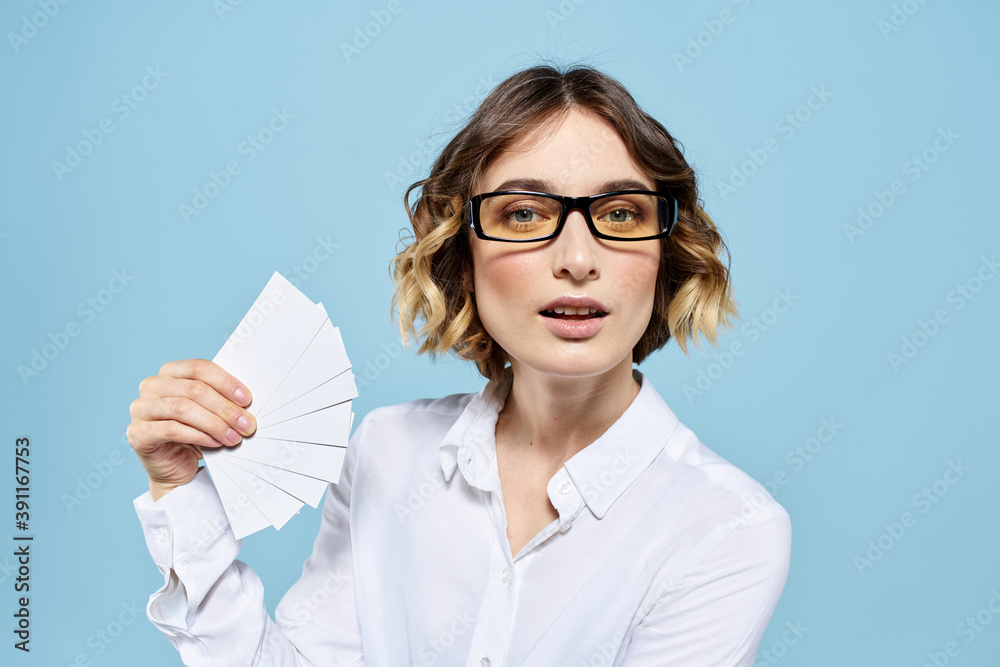 Business woman with business cards credit card blue background work Business woman with business cards credit card blue background work