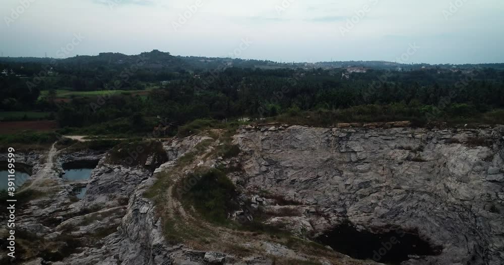 Aerial tilt up over rock formation in Karnataka, India Aerial tilt up over rock formation in Karnataka, India