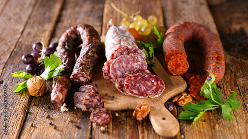 assorted of french salami on wooden board