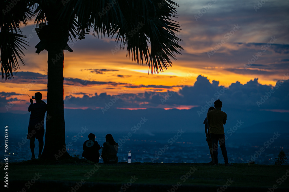 silhouette of a couple on the Hill
