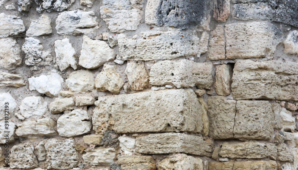 Stones in the wall of the house as an abstract background. Stones in the wall of the house as an abstract background.