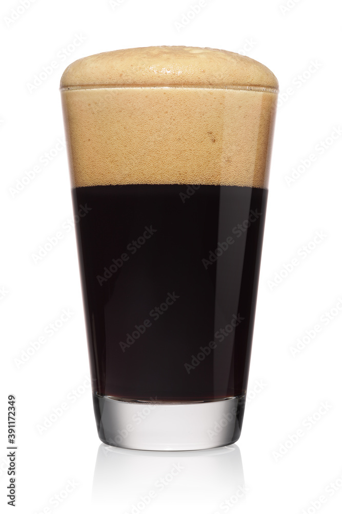 Glass of stout dark beer isolated on a white. Glass of stout dark beer isolated on a white.