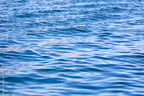 Smooth sea water as an abstract background. © schankz