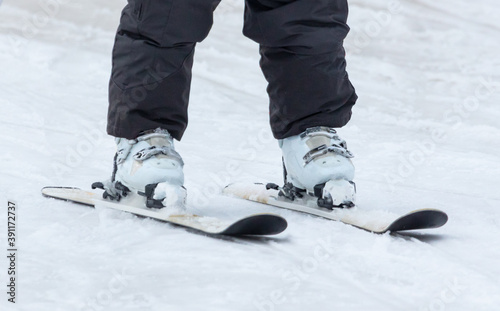 The skier is riding in the snow.