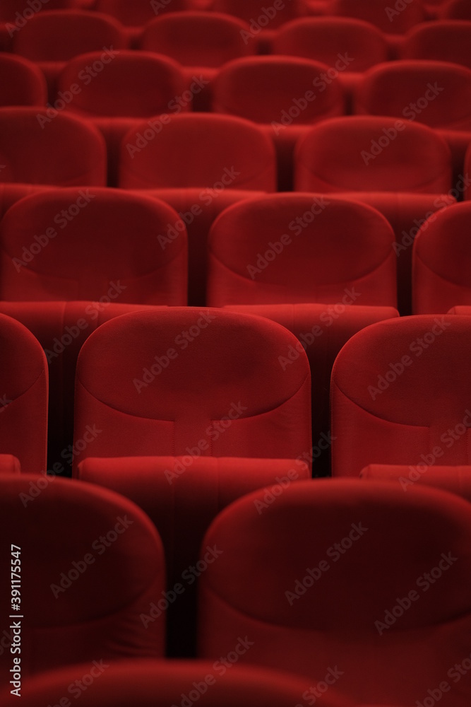 Obraz premium Empty cinema hall with red seats. Movie theatre