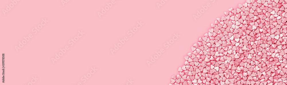 Trendy shining silver candy pink hearts background of cake sprinkles in flat lay with copy space, feminine blogger or festive love gift and Valentine's Day concept. banner mockup. Small hearts Trendy shining silver candy pink hearts background of cake sprinkles in flat lay with copy space, feminine blogger or festive love gift and Valentine's Day concept. banner mockup. Small hearts