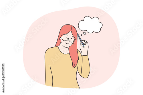 Thinking, having idea, doubt, brainstorm concept. Young red haired positive girl teen student cartoon character standing and thinking with pencil leaning on head with white cloud thoughts sign 