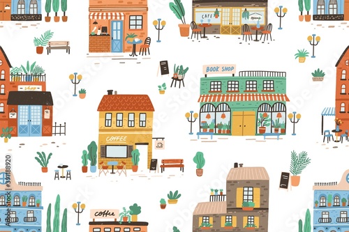 Hand drawn seamless pattern with different cafe, shops and stores. Repeatable background with cute city buildings facades. Backdrop with modern houses exterior. Flat vector cartoon illustration