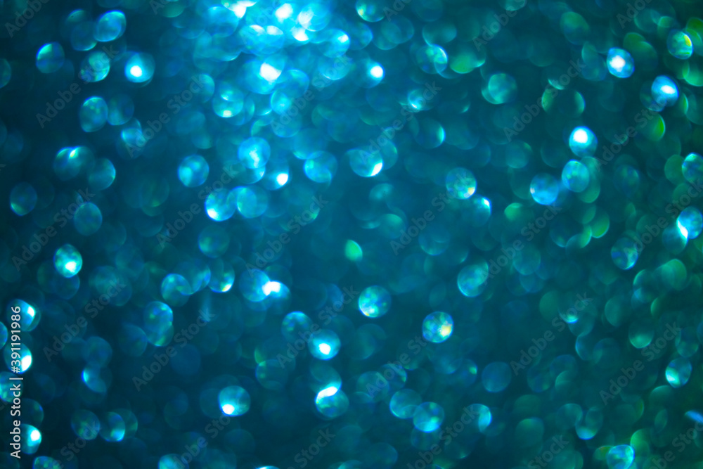 Shiny bokeh background in green blue nautical color, for festive design