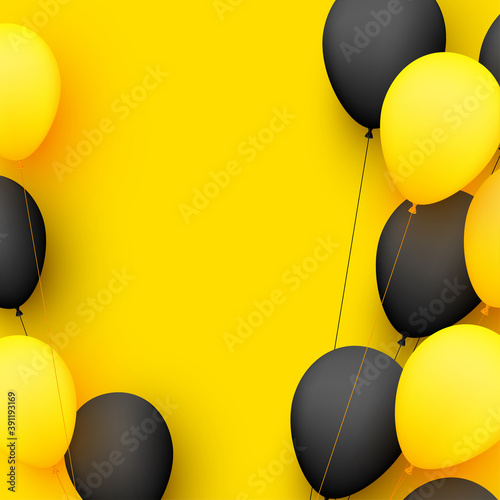 Black and yellow balloons with threads on yellow background.