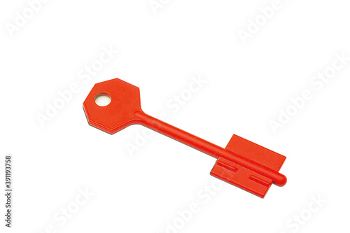 Plastic red key isolated on white background