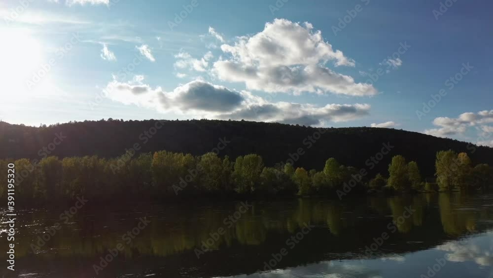 Beautiful calm mountain river in autumn at sunset on a warm evening Beautiful calm mountain river in autumn at sunset on a warm evening