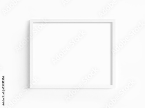 White frame with landscape orientation on a light wall