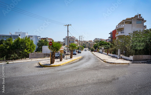 Fototapeta Naklejka Na Ścianę i Meble -  View of streets and buildings in Rafina's port. Greece.