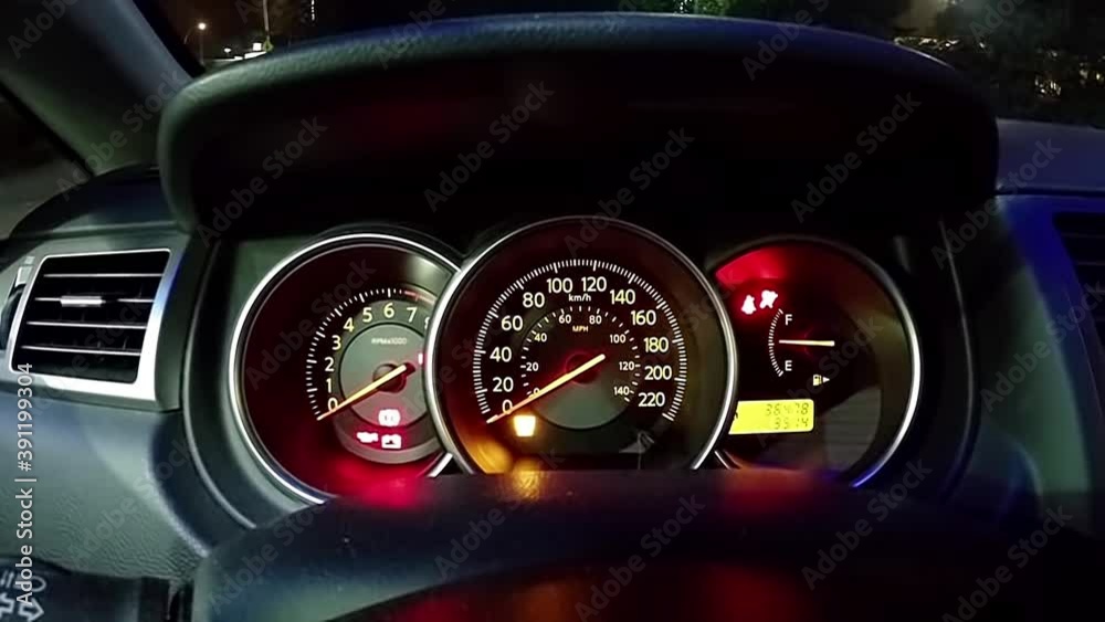 Check light warning and start engine car with wide-angle shot.