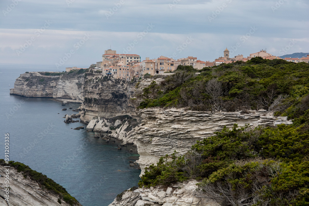 The Limestone cliffs coastline of Bonifacio, a commune at the southern tip of the island of Corsica,