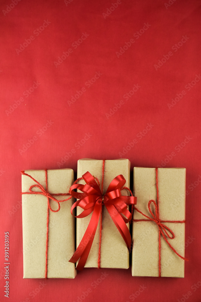 Gift box on red background for Merry Christmas, Brown gift box for happy new yearGift box on red background for Merry Christmas, Brown gift box for happy new year Gift box on red background for Merry Christmas, Brown gift box for happy new yearGift box on red background for Merry Christmas, Brown gift box for happy new year