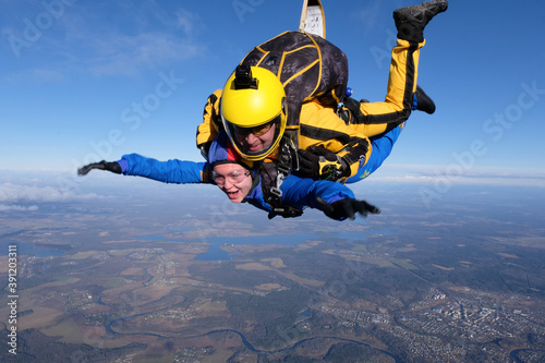 Skydiving. Tandem jump. Flight in the sky.