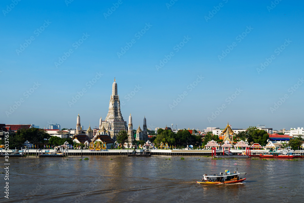 Wat Arun Temple and Chao Phraya river with sky in Bangkok, Thailand