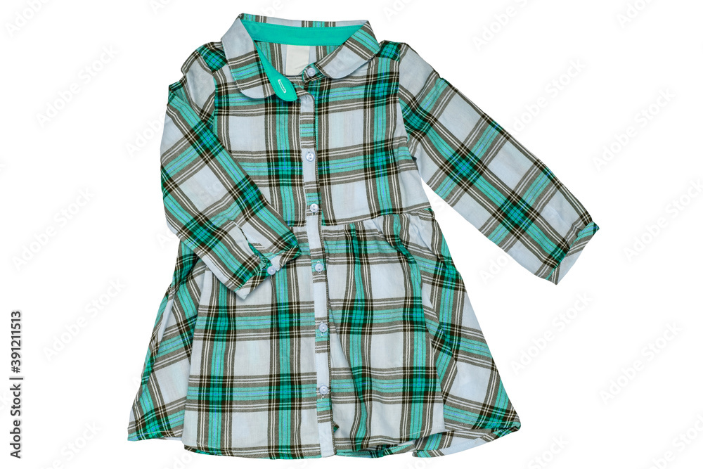 Obraz premium Summer dress isolated. Close-up of a beautiful green white checkered little girl dress with long sleeves isolated on a white background. Children autumn fashion.