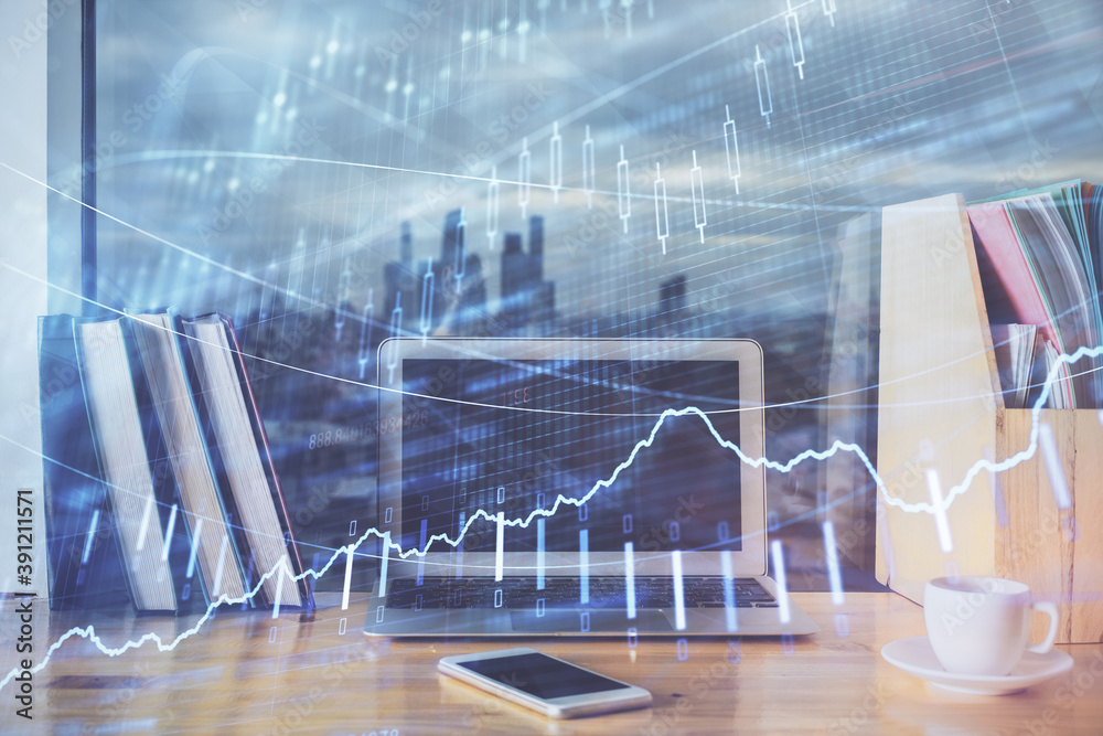 Forex market graph hologram and personal computer on background. Multi exposure. Concept of investment. Forex market graph hologram and personal computer on background. Multi exposure. Concept of investment.