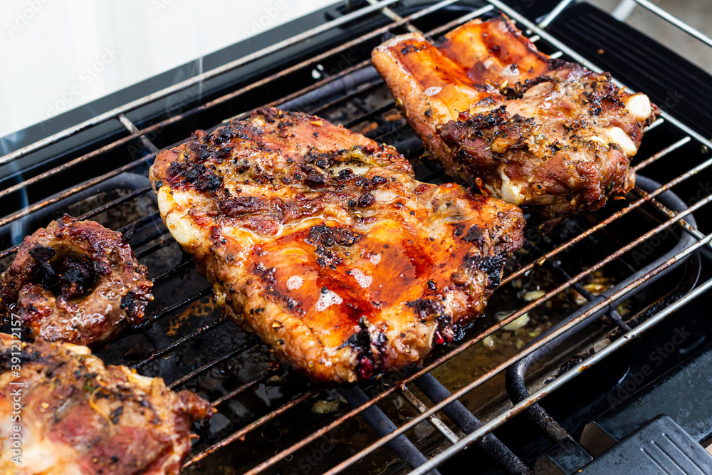 Pork ribs grilled on an electric grill.