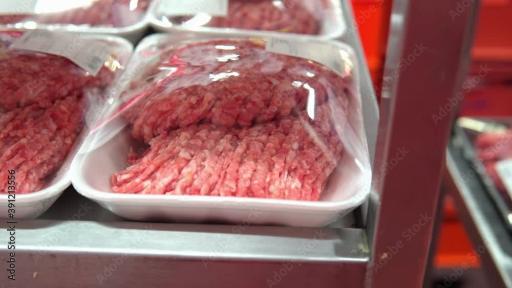 Minced meat in the store close-up. sale of fresh meat in a supermarket