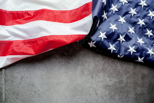 Veterans day. Honoring all who served. American flag on gray background with copy space.