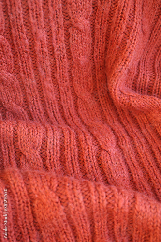 texture of knitted plaid with braids
