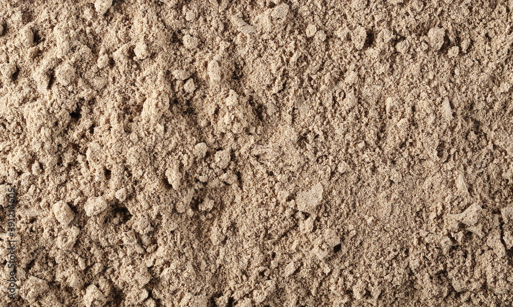 Organic linseed protein powder pile background and texture Organic linseed protein powder pile background and texture
