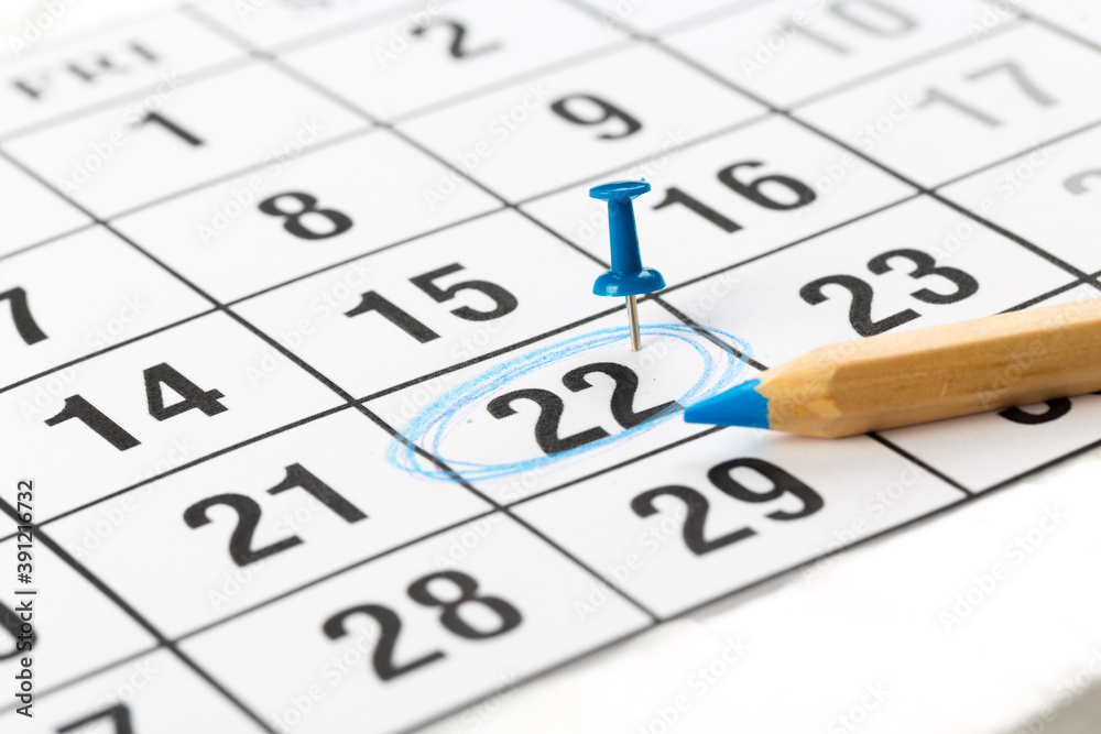 blue buttons on the calendar. Concept idea for planning. blue buttons on the calendar. Concept idea for planning.