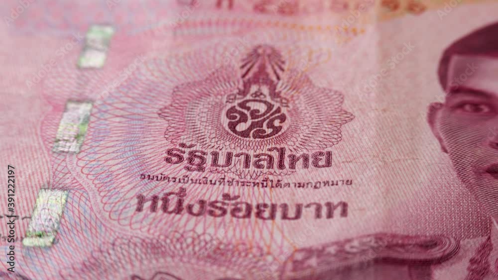 Monogram of King Maha Vajiralongkorn on 100 baht banknote. Paper thai bill