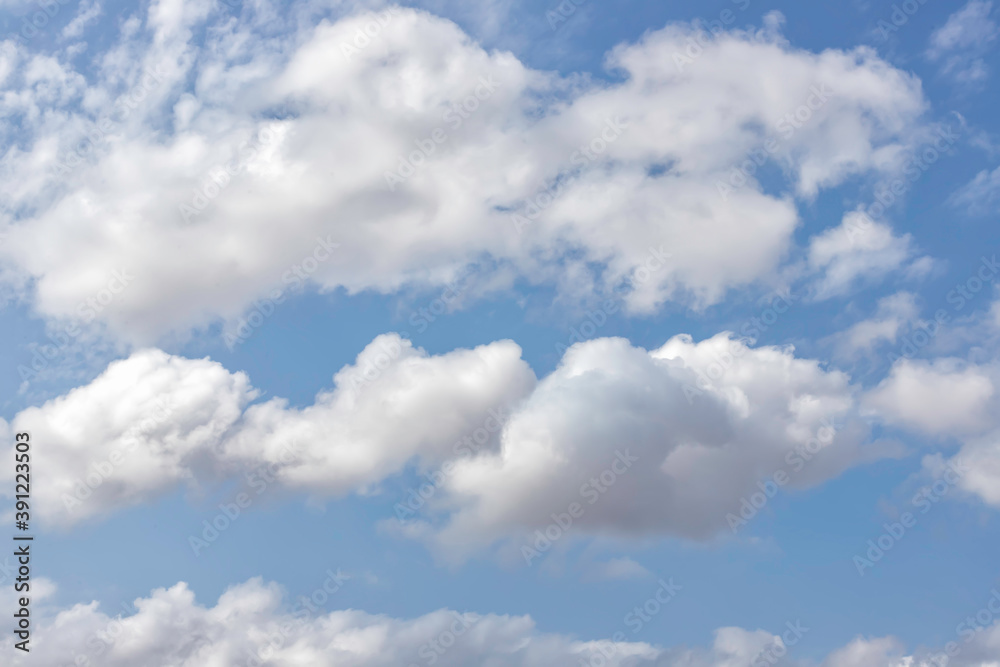 Background of blue sky with white clouds. Skyscape. Graphic design Background of blue sky with white clouds. Skyscape. Graphic design
