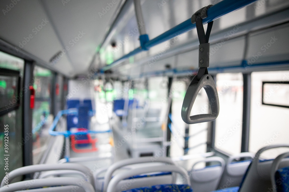 Fototapeta premium Close up, handrail in a new bus