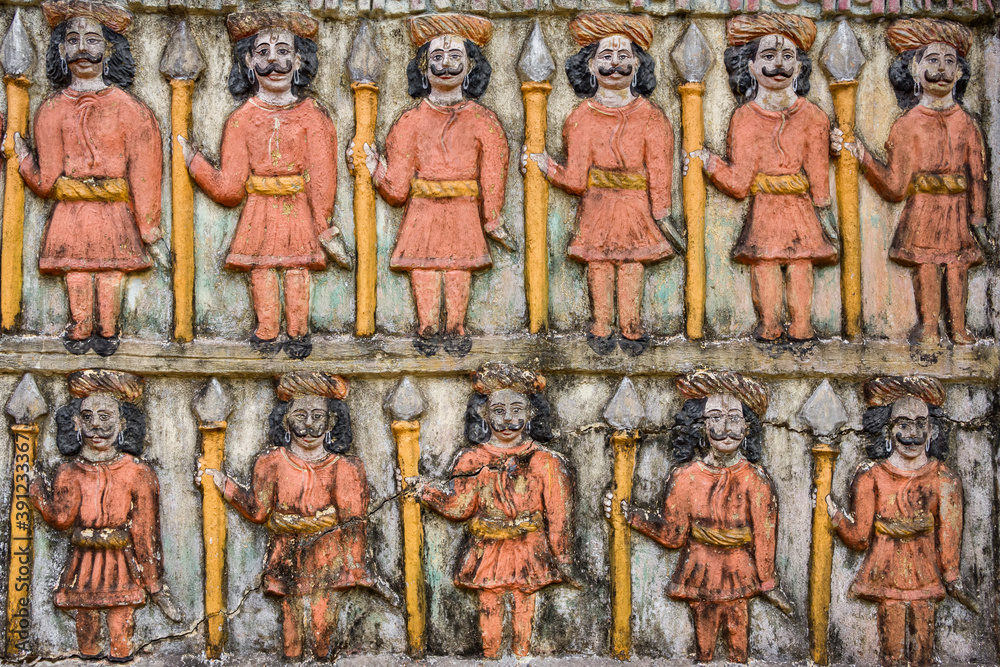 Old vintage colorful carving at the hindu temple in India