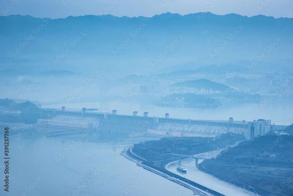 three gorges dam at dusk with blue tone