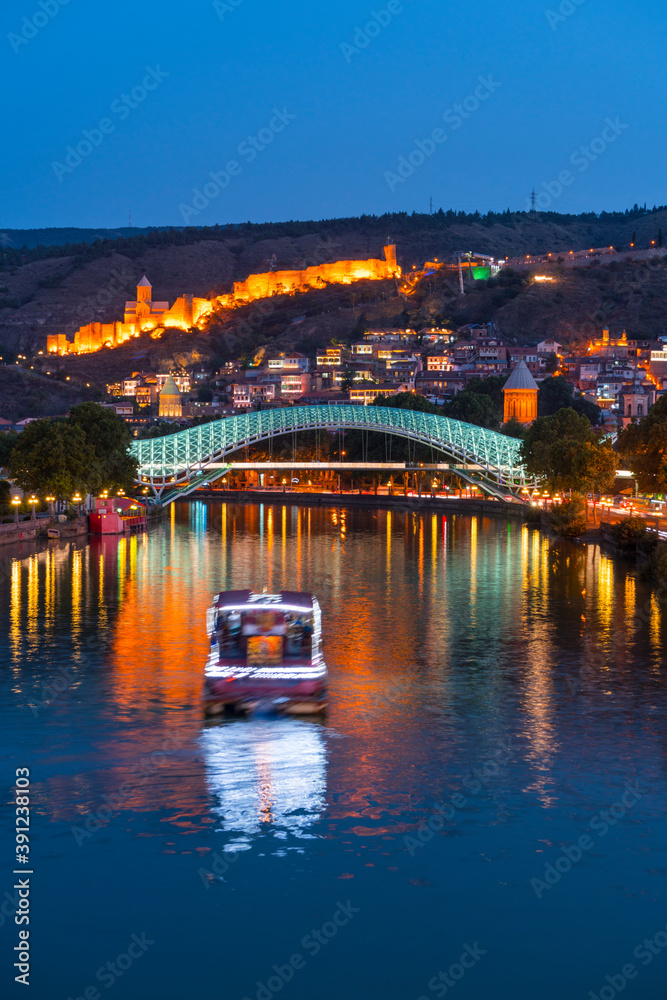 Fototapeta premium Narikala or Old Fortress of Tbilisi, The Bridge of Peace, Kura River, Tbilisi City, Georgia, Middle East