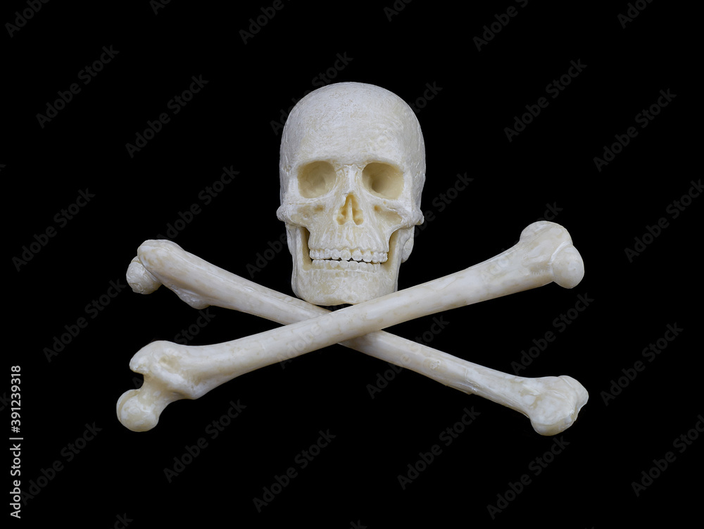 human skull and crossed bones on a black background, a sign stop, be careful, dangerous. human skull and crossed bones on a black background, a sign stop, be careful, dangerous.