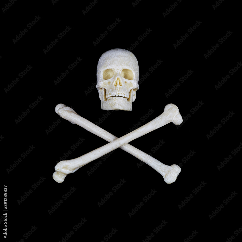 Black human skull with red glowing eyes and crossed bones on a white background, a sign stop, be careful, dangerous. Black human skull with red glowing eyes and crossed bones on a white background, a sign stop, be careful, dangerous.