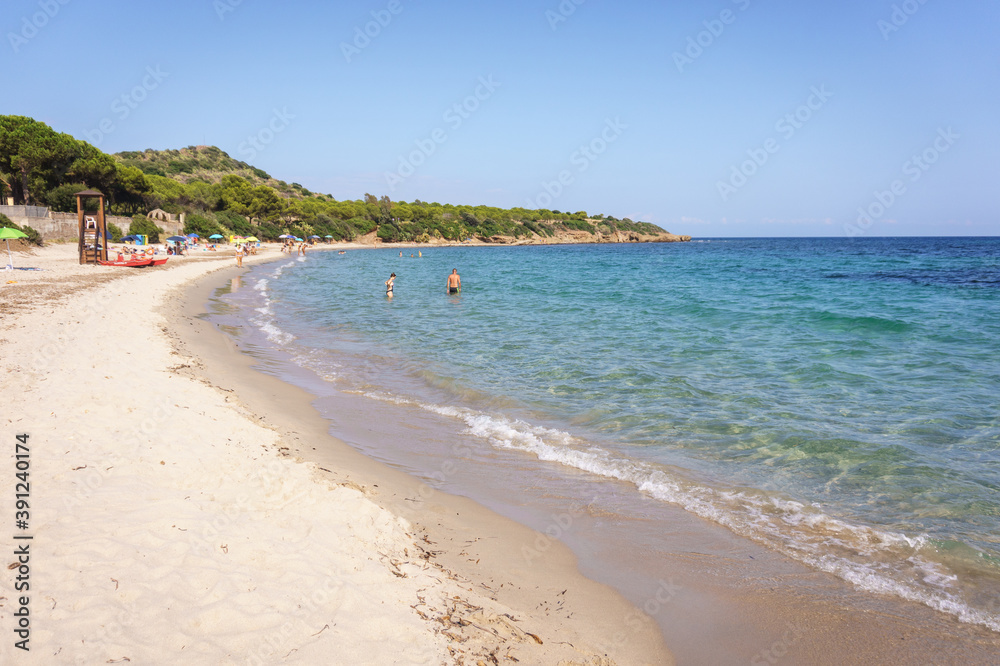 PULA, SARDINIA, ITALY - SEPTEMBER 4, 2019: Santa Margherita di Pula beach near Pula town, South Sardinia, Italy