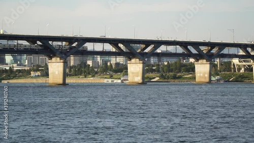 Subway train and other Vehicles Passing Through Cheongdam Bridge Over Han River In Seoul, South Korea - static shot photo